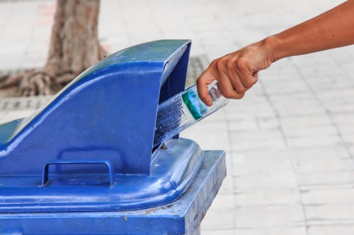 Workers sorting demolition waste materials
